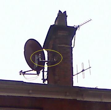 big dish on small  bracket on chimney